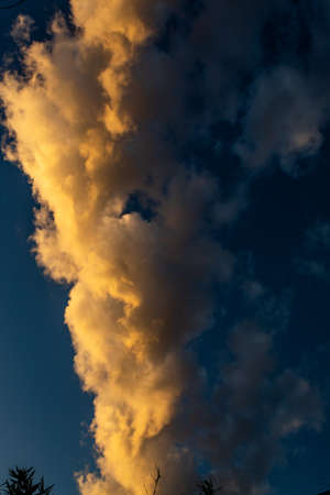 Majestic clouds yellow and withe in the sunset in Mendoza.の写真素材