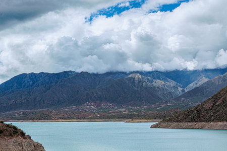 Landscape view of mountain and lake with cloudy sky in Kashmir, Indiaの写真素材