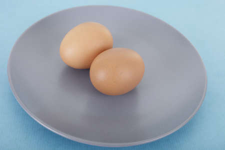 Two brown eggsの写真素材