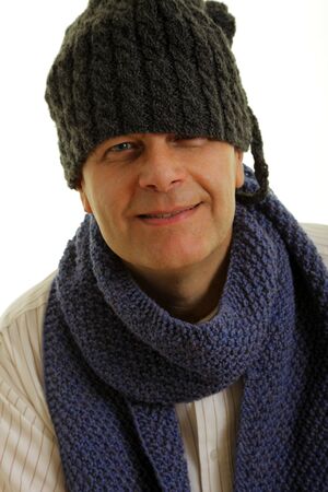 Adult man wearing winter cap on an isolated background の写真素材