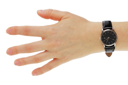 Classic black wristwatch on a woman hand の写真素材