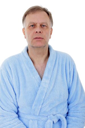 Portrait of man with blue eyes in bath robe の写真素材