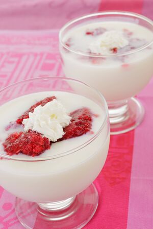 Fresh yogurt with raspberrry and cream の写真素材