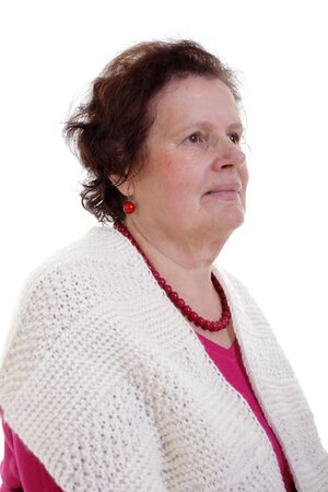 Senior woman with red jewelry の写真素材