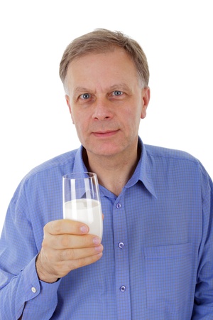 Handsome man with glass milk の写真素材