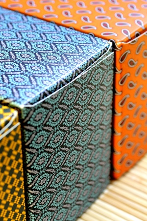 Three english tea boxes with floral pattern の写真素材