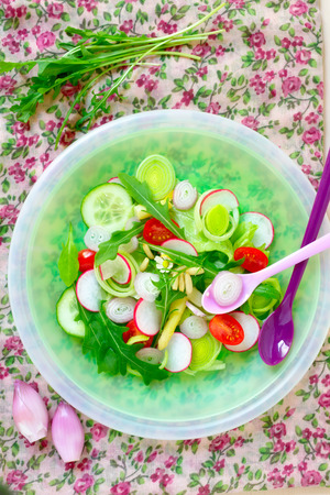 Mix salad with rucola, radish, tomato and shallo onion の写真素材