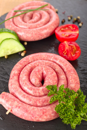 Raw pork rolled sausageの写真素材