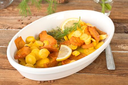 Baked sweet potato and carrotsの写真素材