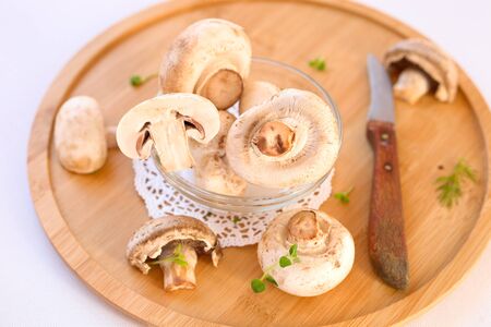 Raw champion mushrooms.の写真素材