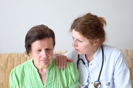 Senior woman and her doctorの写真素材