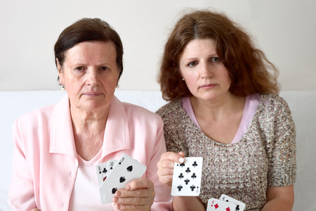 Women playing cardsの写真素材