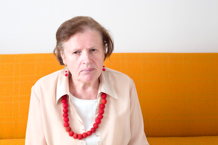 Overdressed senior womanの写真素材