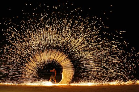 Koh Chang,Trad, Thailand, April 21, 2017, beautiful fire circle spining show talent at night party beach island in thailandのeditorial素材