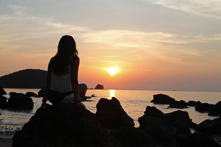 Koh Mak Island, Trad, Thailand, April 25, 2017, women shadow beautiful sunsetの写真素材