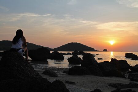 Koh Mak Island, Trad, Thailand, April 25, 2017, women shadow beautiful sunsetの写真素材