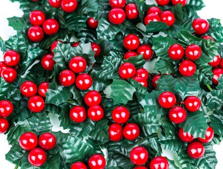 Stack of plastic cherry christmas decoration, Christmas vacation background.の写真素材