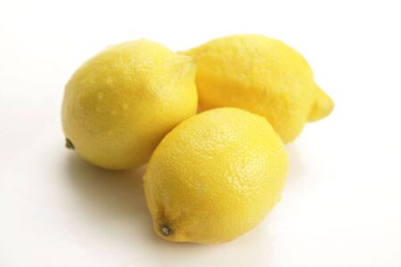 three lemons on white backgroundの写真素材