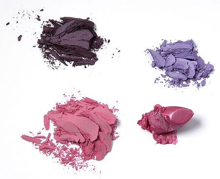 different cosmetic products crushed on white backgroundの写真素材