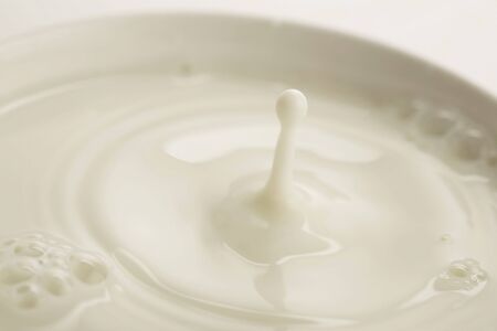 backdrop of milk in a cupの写真素材