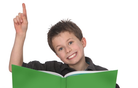 cute young boy doing homeworkの写真素材