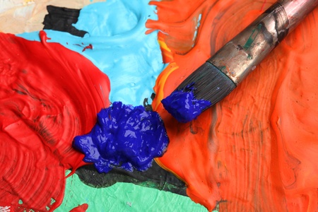 paintbrush on an artists paletteの写真素材