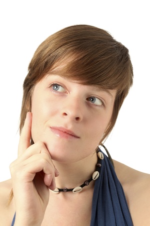 young woman looking happy and thightfullの写真素材