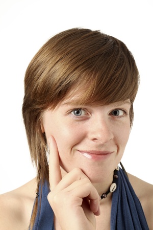 young woman looking happy and thightfullの写真素材