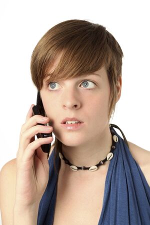 young woman with cell phone listeningの写真素材