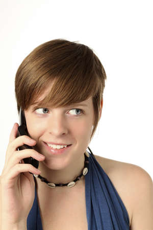 young woman with cell phone listeningの写真素材
