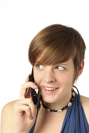 young woman with cell phone listeningの写真素材