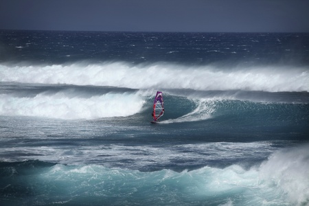 Windsurfer in big waves on Mauiの写真素材
