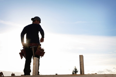 A carpenter working on a consruction siteの写真素材