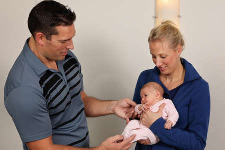 A chiropractor treating a new born babyの写真素材