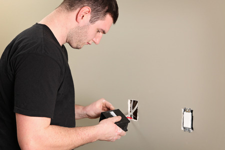 An Electrician working on a new construction site