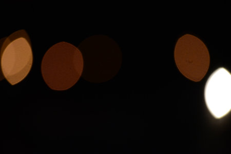 Abstract background. blur bokeh. Blurry multicolor light from the lamp in the distanceの写真素材