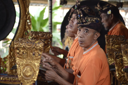 Unidentified people in traditional clothes during a religious ceremony.の写真素材