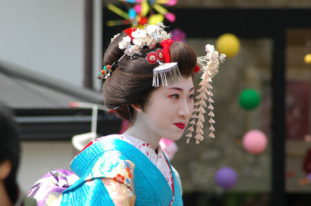 Kamishichiken Kyoto, Japan-April 03,2009 Maiko has attent to Baika-sai Festival also Baien Ume Gardenのeditorial素材