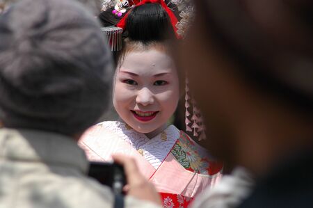 Kamishichiken Kyoto, Japan-April 03,2009 Maiko has attent to Baika-sai Festival also Baien Ume Gardenのeditorial素材