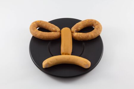 Fancy Sausage on dish with isolate background.