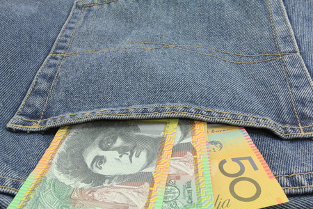 Australia dollar in the pocket of blue jean.の写真素材