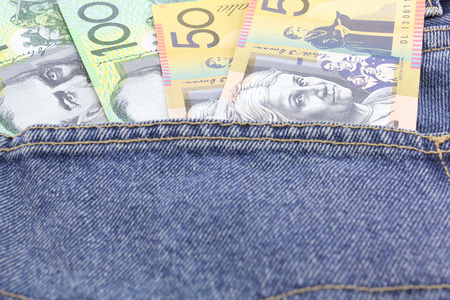 Australia dollar in the pocket of blue jean.の写真素材