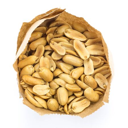 Peanuts in paper bag isolated on a white background