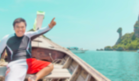 Blurred happy man on the boat : Holiday and summer concept background.の写真素材