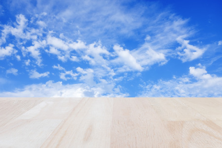 Plank wood with blure blue sky background : Suitable use for montage your product.の写真素材