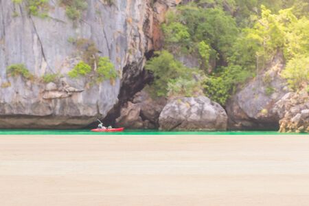 Plank wood on blurred kayaking with big rock background : Can use for montage or display your product.の写真素材