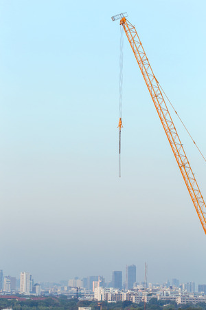 Crane with city background.の写真素材