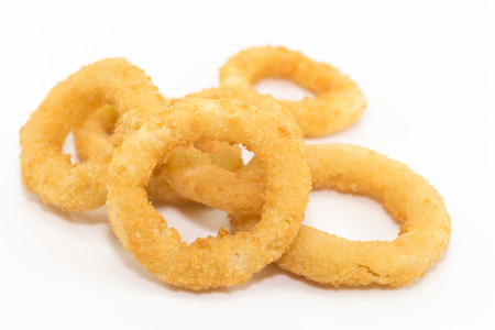 Deep fried onion ring on white background with copy space.の写真素材