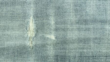 Ragged jean pattern for texture and background.の写真素材