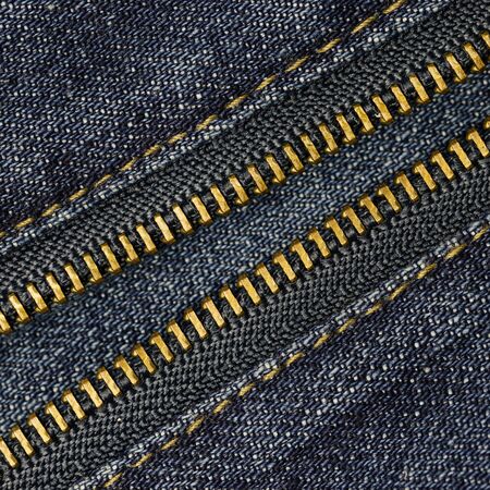 Close up metal zipper openning on blue jean.